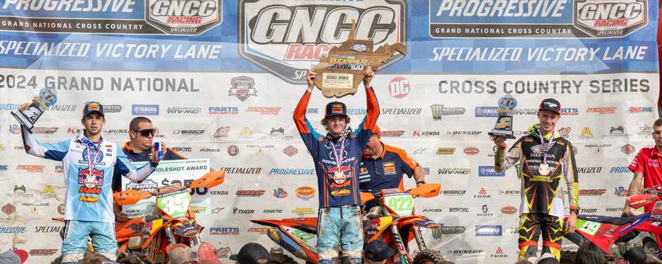 GRANT DAVIS AND JOHNNY GIRROIR STAND ON TOP OF BUCKWHEAT 100 GNCC PODIUM
